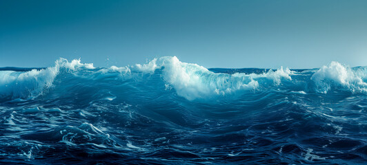 Crisp blue ocean waves under clear skies