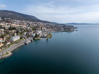 Fototapeta na wymiar The Swiss city of Neuchatel with the lakeside promenade and Lake Neuchâtel from the air