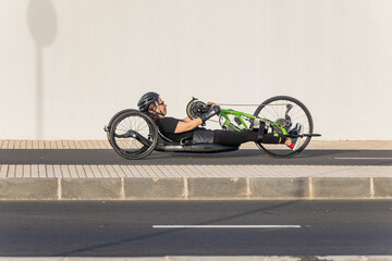 Determined Female Athlete Competes in Handbike Race