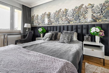 Stylish bedroom in gray finishing
