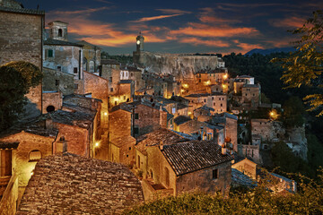 Sorano, Grosseto, Tuscany, Italy. Sunrise landscape of the picturesque medieval village in the Tuscan hills - 770093438