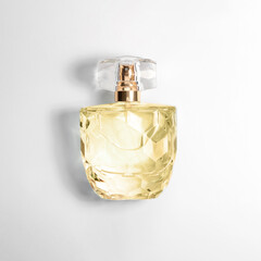 Luxury perfume in bottle on white background, top view