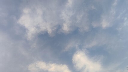 Blue gray light sky nature white clouds whether background , sun face