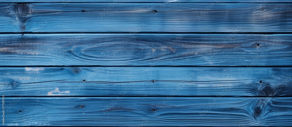 Poster a detailed shot of an electric blue wooden table with a intricate pattern of parallel lines in shade
