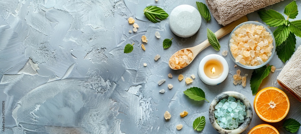 Poster tranquil spa setting with aromatherapy oils arranged on a serene grey table surface
