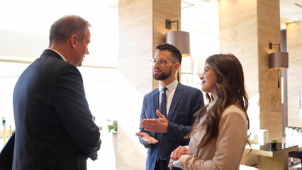 Business partners meeting at the hotel before a business conference