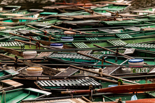 Cluster of moored boats on a river in Vietnam
