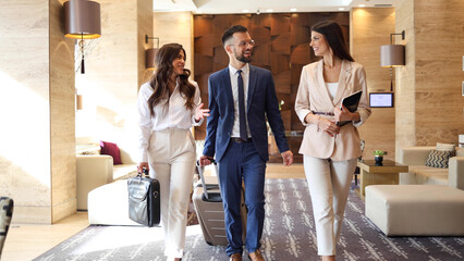 Young business team going on a business conference at the hotel