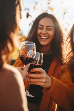 friends clink glasses of wine feast Generative AI