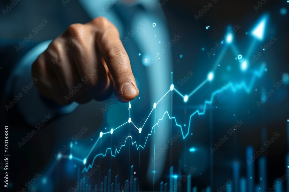 Poster a man is pointing at a graph on a computer screen
