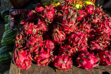 Red dragon fruit with red pulp. Hylocereus costaricensis, is on display at a street market in Brazil. Known Costa Rican night cactus, it is a species of cactus native to Central America.