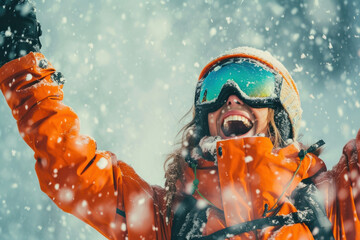 Happy woman in orange jacket and ski gear standing in snow on a sunny winter day - obrazy, fototapety, plakaty