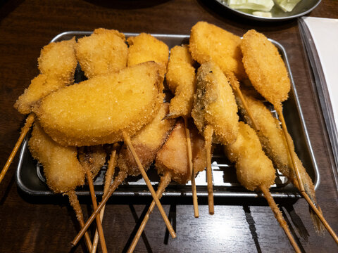 A tray full of fried Japanese food, or kushi kastu