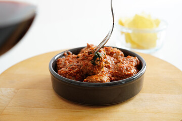 Albondigas (Spanish Meatballs in tomato sauce), one of Spain's most popular tapas