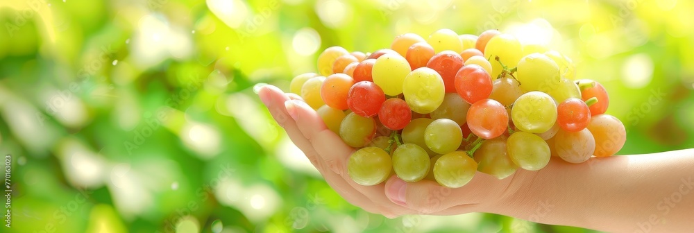 Poster hand holding fresh grapes with focused background, creating an ideal space for adding text