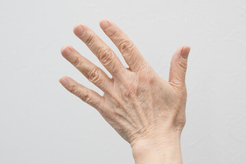 Close-up of an elderly person's hand