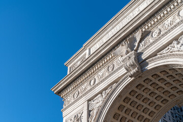 Fototapeta na wymiar Washington Square Arch against blue sky
