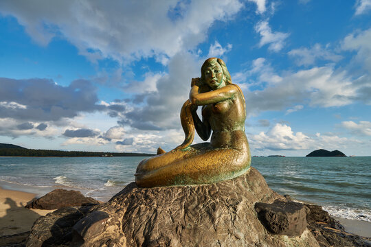 a sculpture of Songkhla Golden Mermaid at Samila Beach, Songkhla, Thailand.