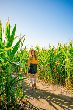 woman walking in the corn field