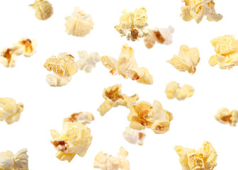 Tasty fresh popcorn flying on white background