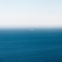 single small boat on the blue ocean 
