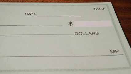 4 dolly on blank green generic check on table