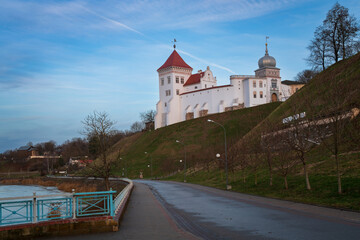 Fototapeta na wymiar View of the Grodno Old Castle (Grodno Upper Castle) on the banks of the Neman River on a sunny day, Grodno, Belarus