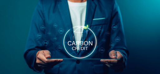 Businessman uses technology to exchange carbon credits Zero net greenhouse gas emissions target...