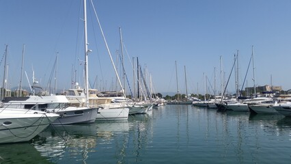 Moored boats in port Vauban with Fort Carre in Antibes, France