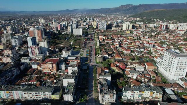 Elbasan Cityscape Showcasing Mosque, Castle, and Old City Clock Tower Amidst a Cluster of Buildings