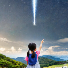 the image of a girl staring at a shooting star falling from the sky