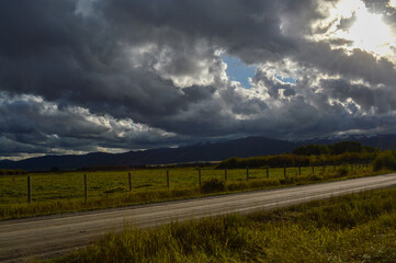 Fototapeta na wymiar Idaho Horizons: Stormy Farmland Skyline