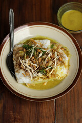 Chicken Porridge with yellow soup. 