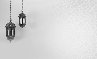 Islamic background for a Ramadan Kareem, Eid Mubarak, or Islamic concept. Traditional lantern are isolated on a Black and white surface.