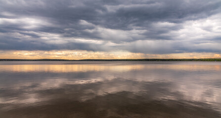 Blue lake with cloudy sky, natural background