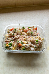 Homemade rice salad with vegetables and tuna