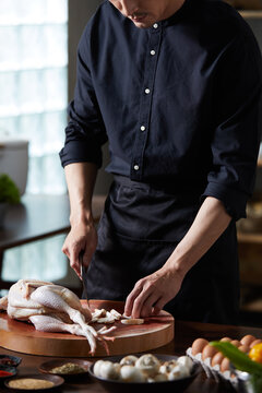 Cook making dishes in the kitchen