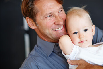 Love, smile and portrait of man with baby for care, safety and childhood development on fathers...