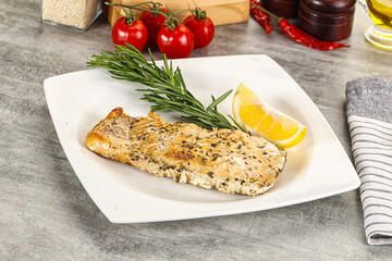 Baked salmon fish served rosemary