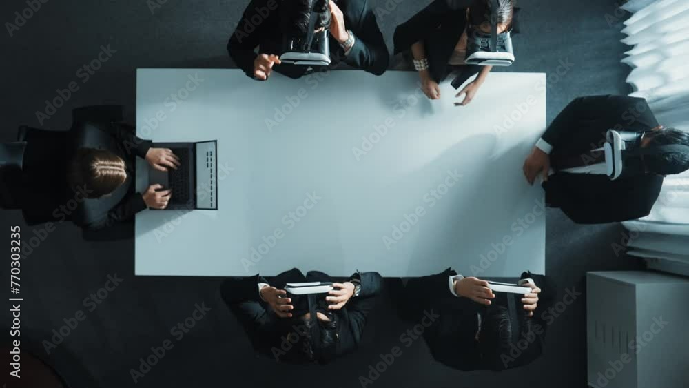 Poster top down aerial view of diverse data analysts wearing vr headset and stand around table while using 