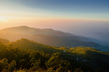 Beautiful sunrise over hills with tea plantations near Haputale in Sri Lanka.. - 770311097