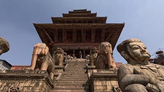 close up View over Stone steps and guarding statues at the main pagoda of Nyatapola Temple Bhaktapur, Nepal. Durbar Square
