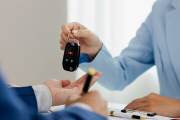 Car insurance sales representative Asian woman or lease or agreement Buying or selling a new or...