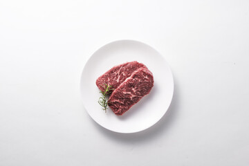 Fresh meat on a plate viewed from above