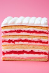 Close up view of a piece of strawberry cream cake on pink background.