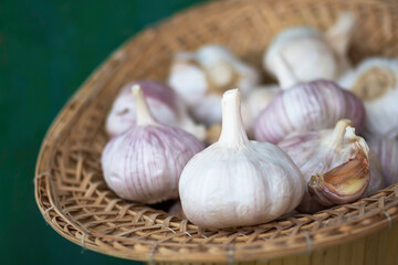 Garlic bulbs in vintage baskets