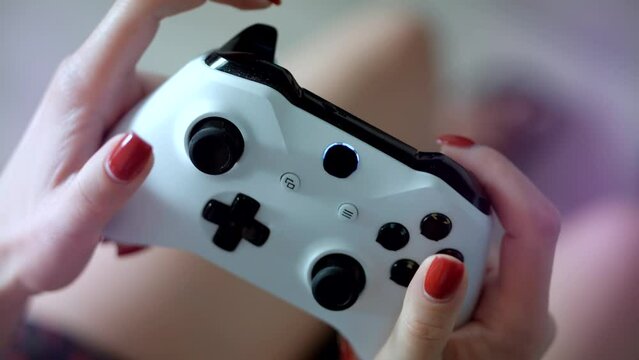 Gamer virtual playing on joystick video console	