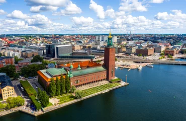 Abwaschbare Fototapete Stockholm, Sweden. Stockholm City Hall. Panorama of the city in summer in cloudy weather. Aerial view © nikitamaykov