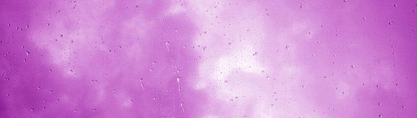 Raindrops, Water Drops, Rain on a Glass Pane, Rainy Weather with Clouds, Pink Background
