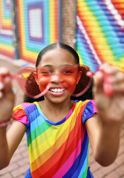 Girl smiling through heart Glasses in Washington, DC